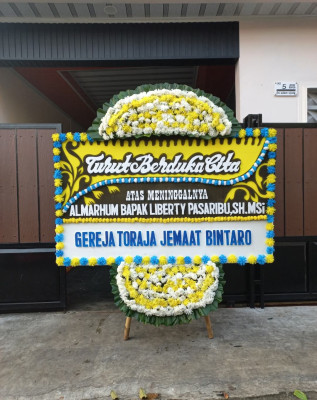 Papan Bunga Duka di Bimomartani